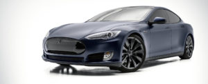 tesla model s signature wrapped satin xpel stealth paint protection clear bra northwest auto salon front shot cyclorama 1